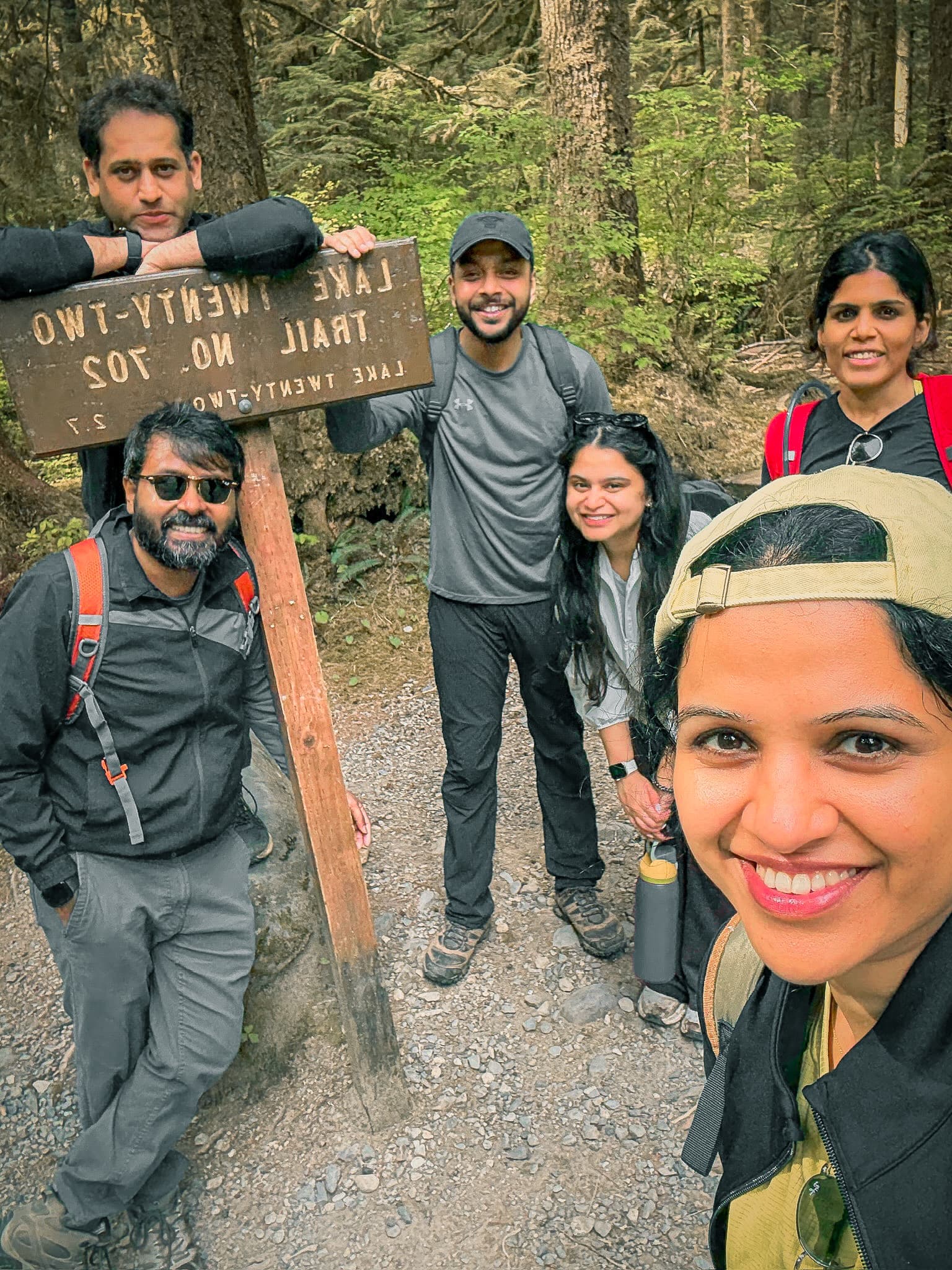 Group photo at the Lake Twenty-Two Trail No. 702 sign